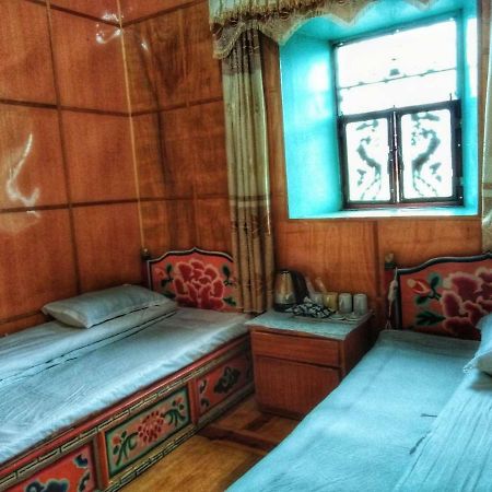 Zishuo Zihua Guest House Daocheng Bagian luar foto