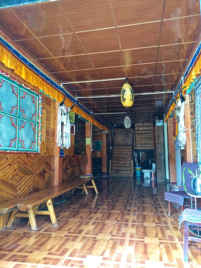 Zishuo Zihua Guest House Daocheng Bagian luar foto