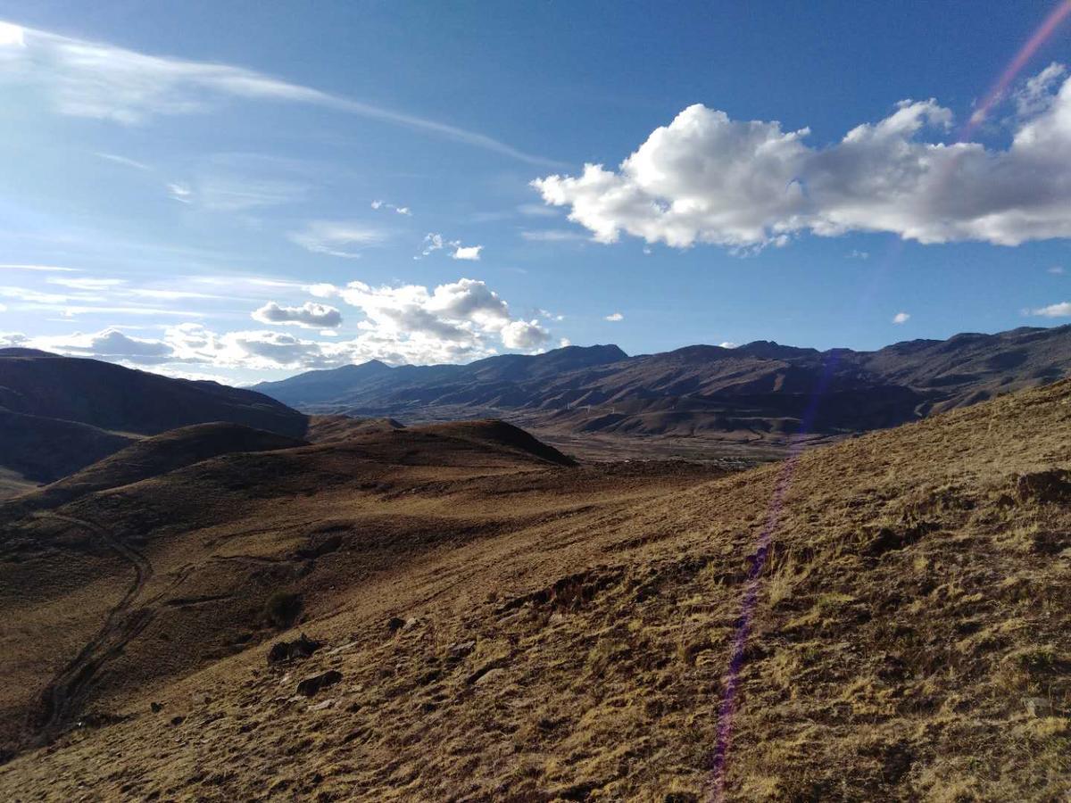 Zishuo Zihua Guest House Daocheng Bagian luar foto