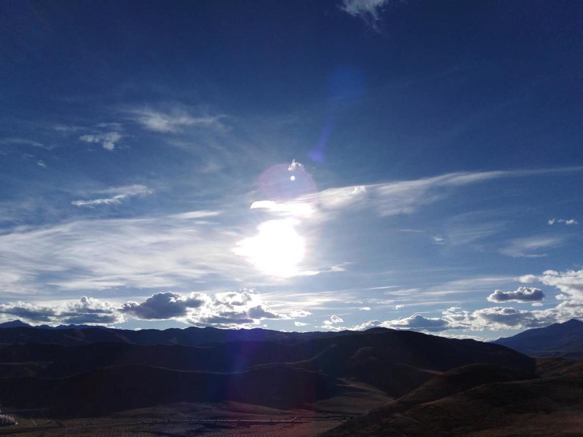 Zishuo Zihua Guest House Daocheng Bagian luar foto