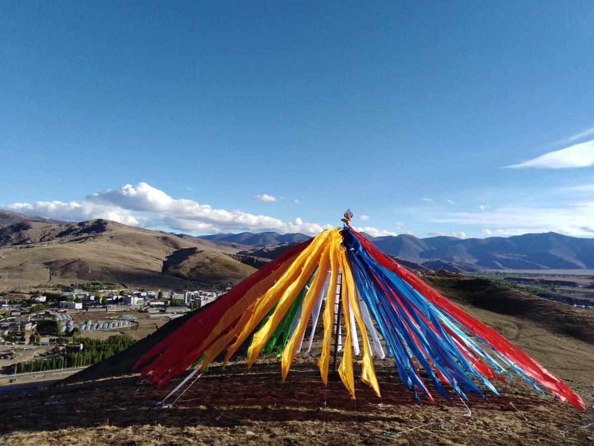 Zishuo Zihua Guest House Daocheng Bagian luar foto