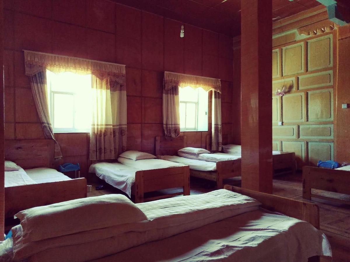 Zishuo Zihua Guest House Daocheng Bagian luar foto
