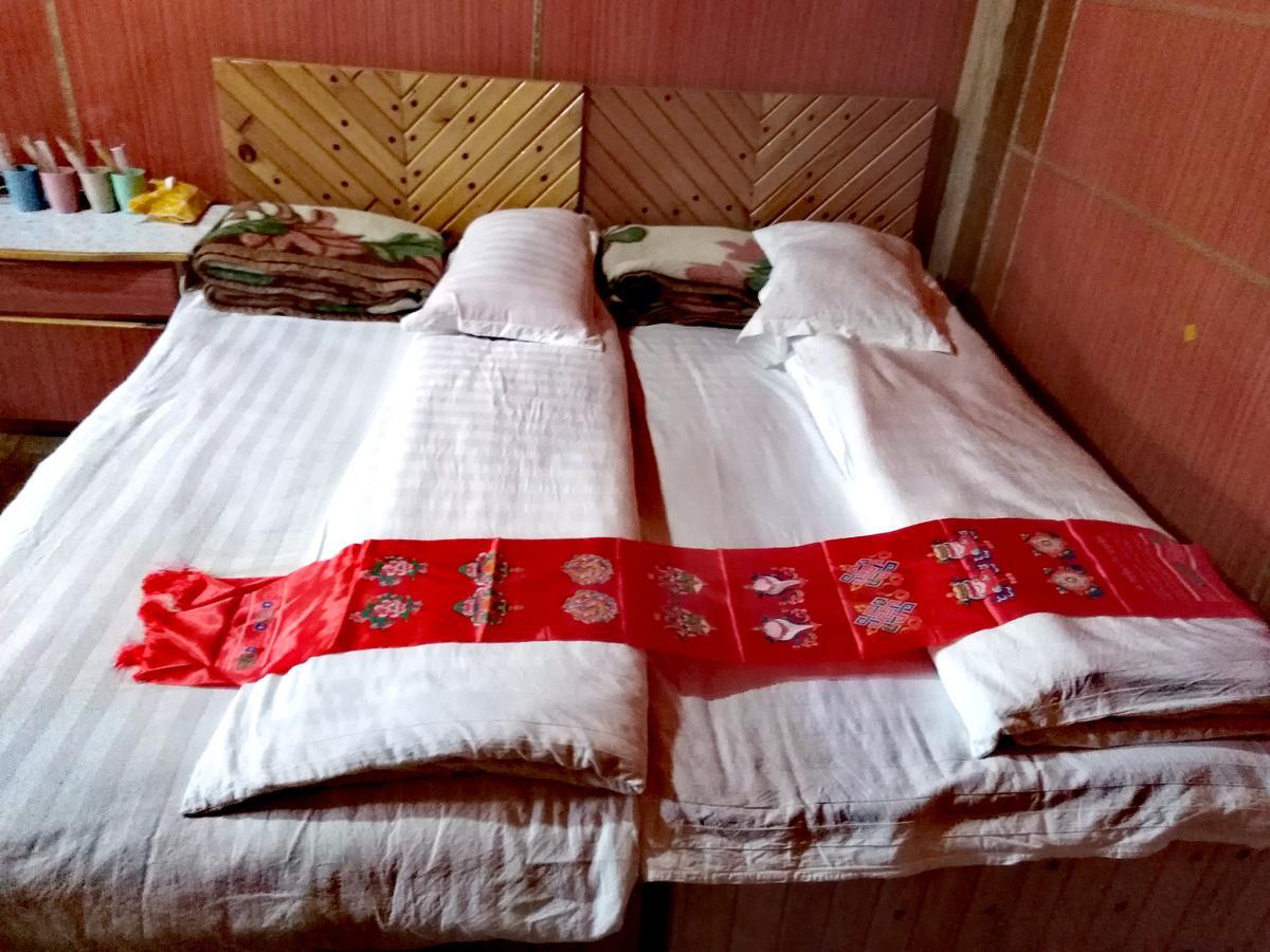 Zishuo Zihua Guest House Daocheng Bagian luar foto