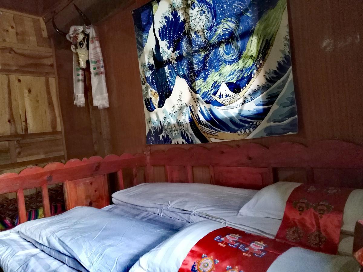 Zishuo Zihua Guest House Daocheng Bagian luar foto