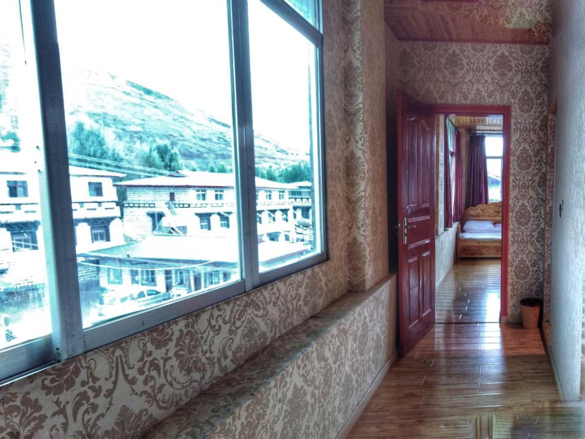 Zishuo Zihua Guest House Daocheng Bagian luar foto
