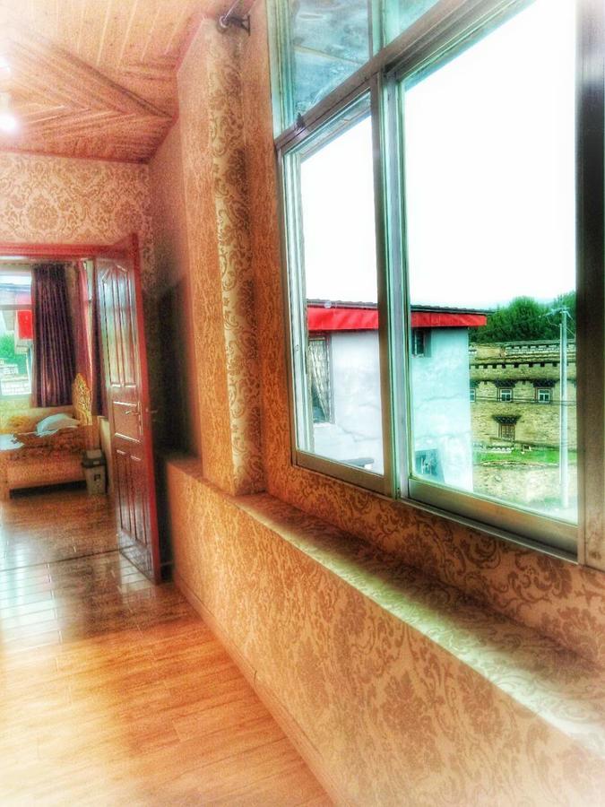 Zishuo Zihua Guest House Daocheng Bagian luar foto