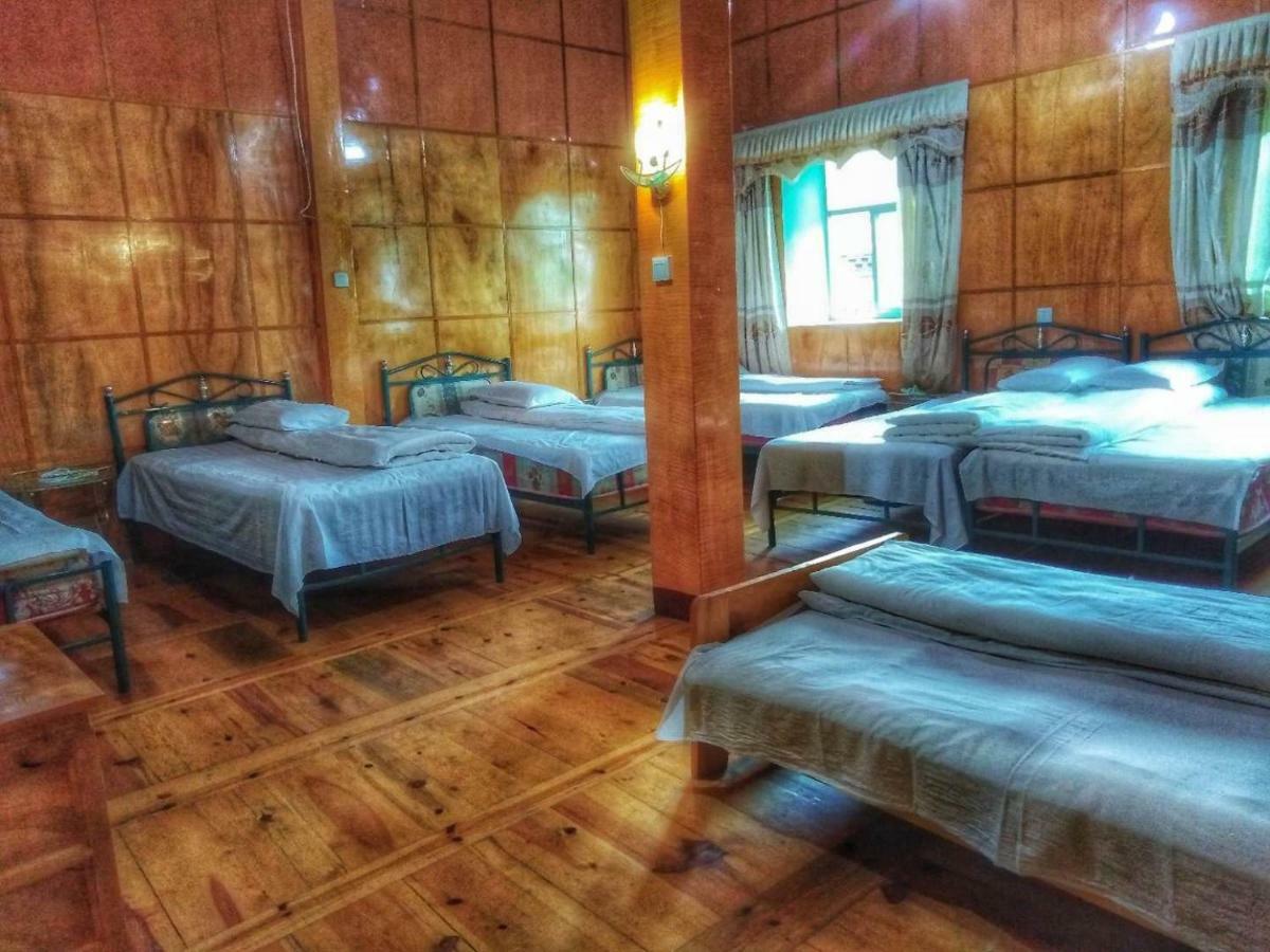 Zishuo Zihua Guest House Daocheng Bagian luar foto