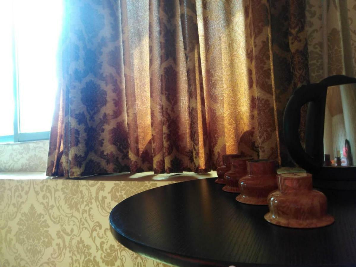 Zishuo Zihua Guest House Daocheng Bagian luar foto