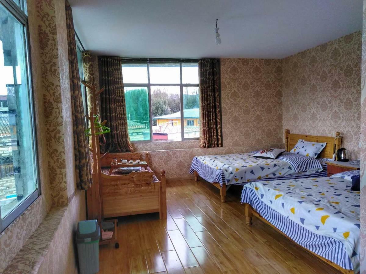 Zishuo Zihua Guest House Daocheng Bagian luar foto