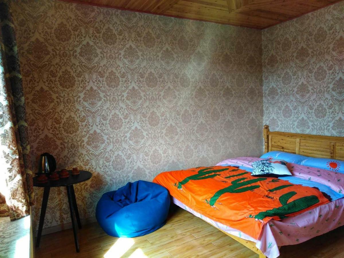 Zishuo Zihua Guest House Daocheng Bagian luar foto