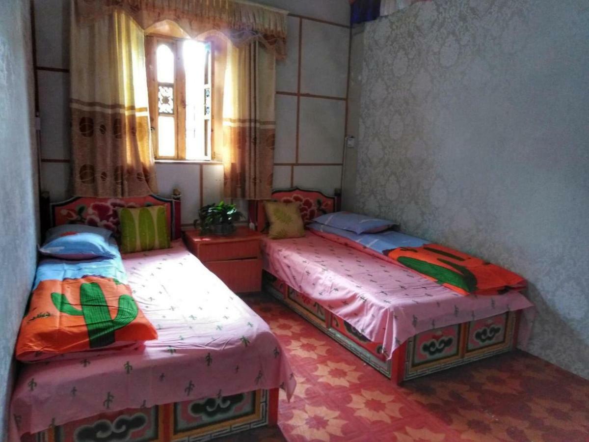 Zishuo Zihua Guest House Daocheng Bagian luar foto
